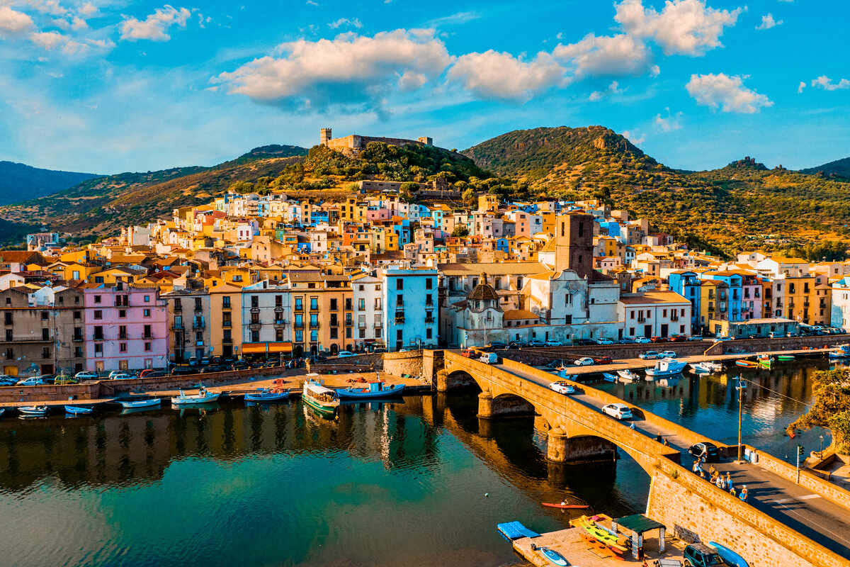 Bosa Sardinia with colored houses and a medieval castle